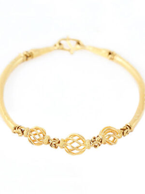 Gold bracelet isolated on white background